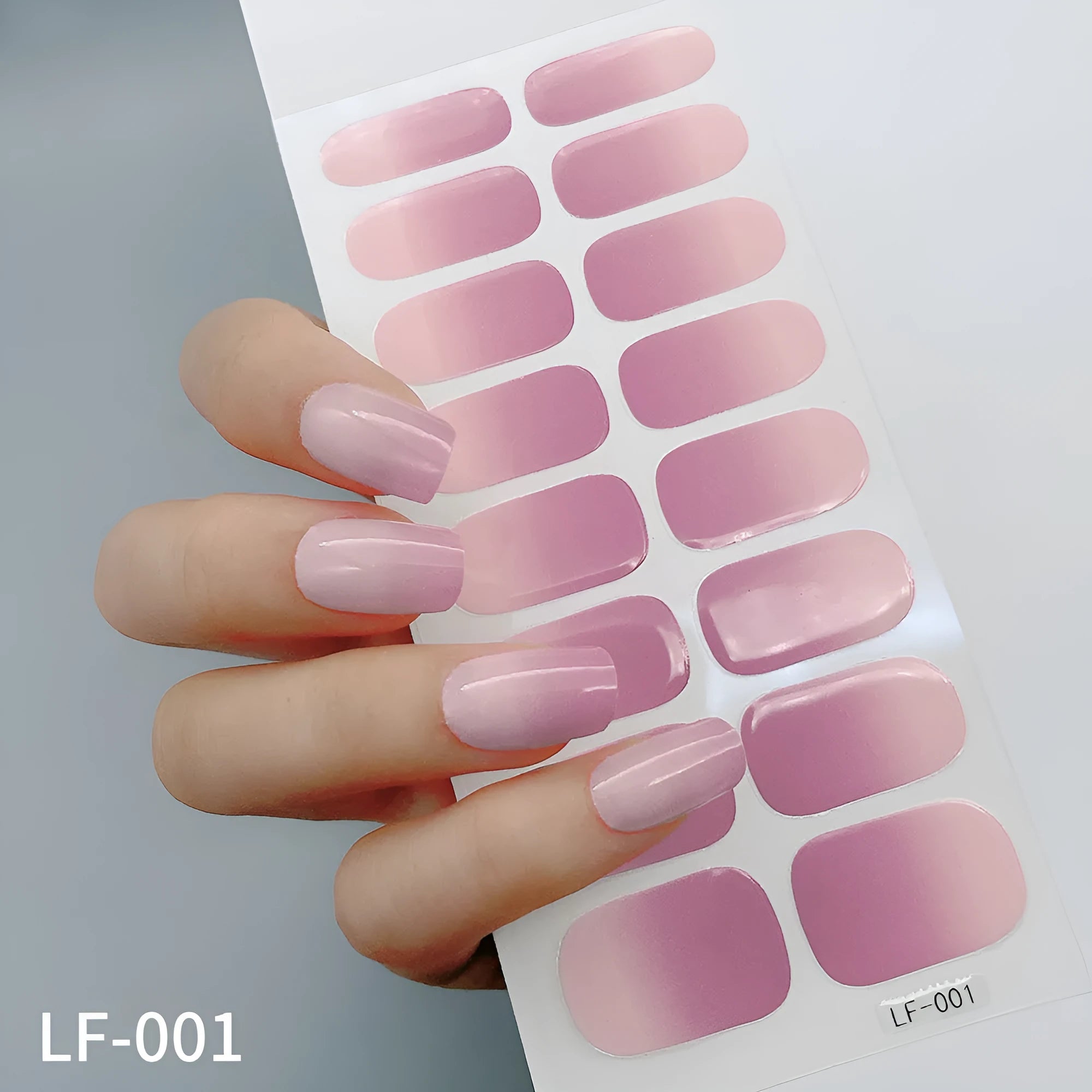 Manicure sticker sheet with 16 small nail art designs including solid colours, patterns, and European style decorations