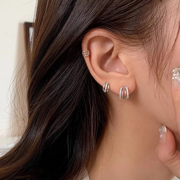 Geometric 925 sterling silver needle earrings with electroplated finish in three size options
