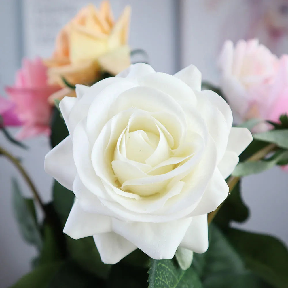 Silk fabric artificial rose bouquet in assorted colours with realistic petals, approximately 42cm long
