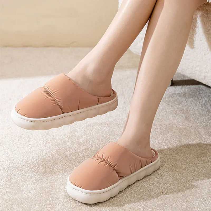 Down cotton couple slippers with artificial leather upper and non-slip rubber soles in multiple colour options