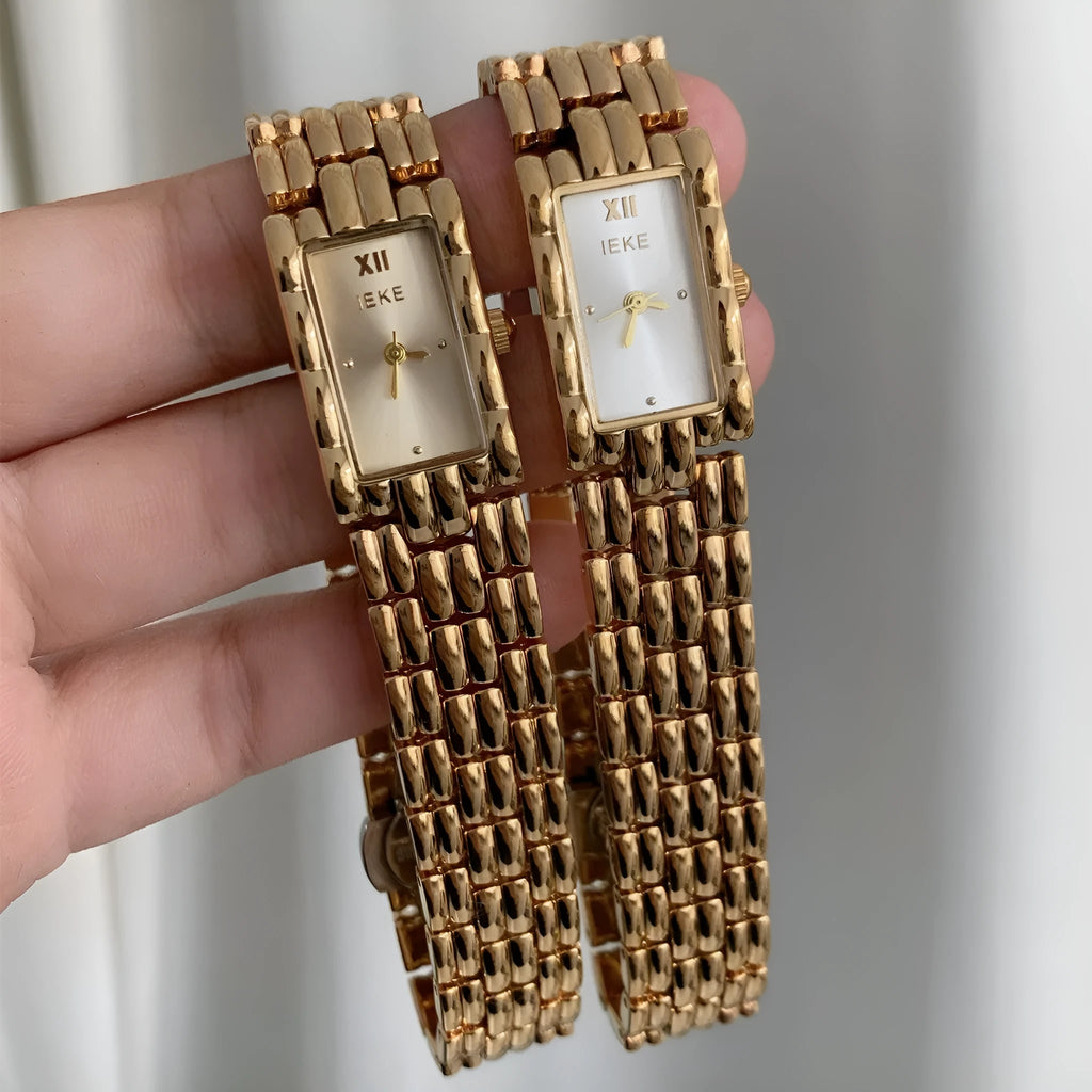 Women's stainless steel bracelet watch with 15mm dial and butterfly buckle