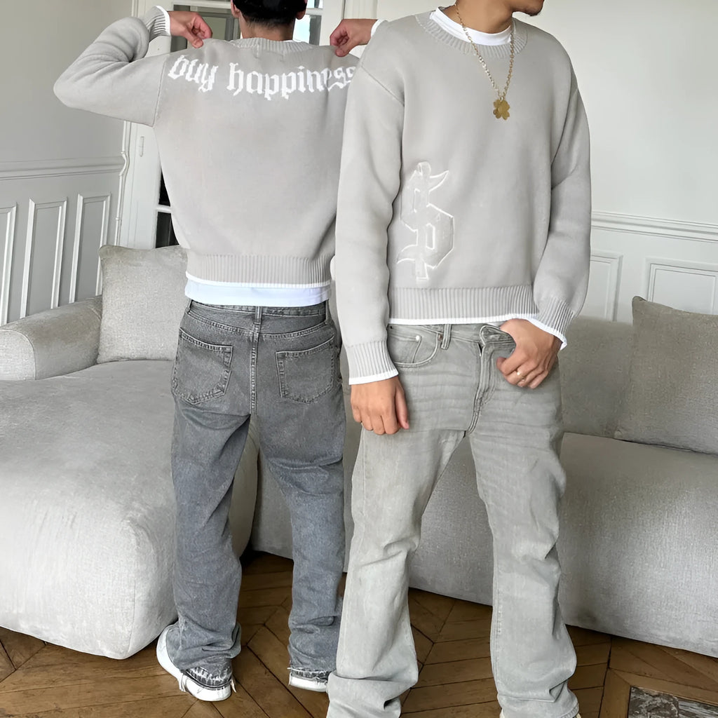 Grey jacquard knitwear coat loose-fitting pullover style with textured weave pattern