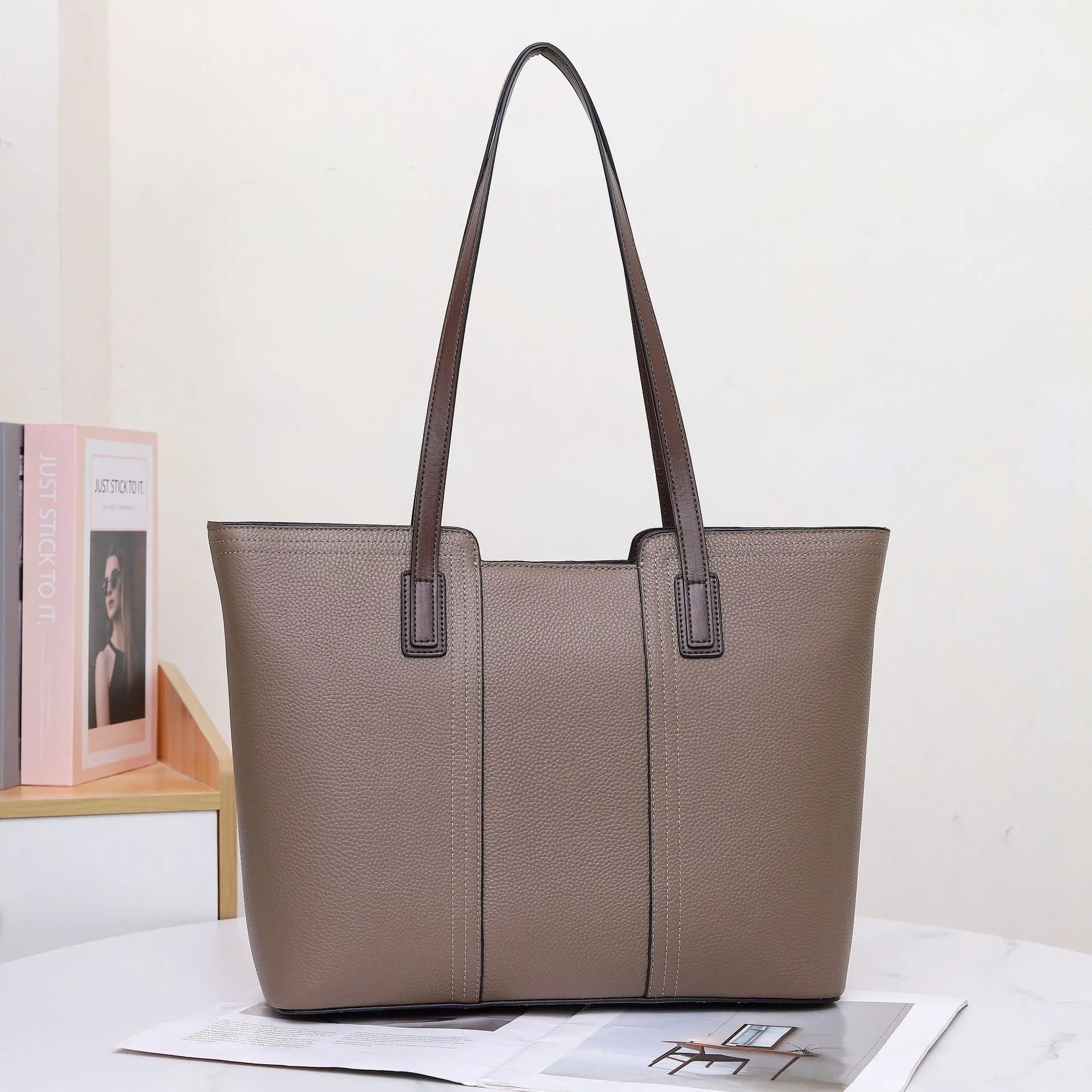 Women's genuine leather commuter shoulder bag in khaki colour with sandwich pocket and internal organisation