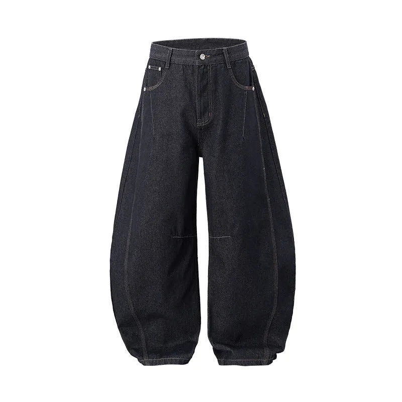 Men's wide leg denim trousers in original cow colour, showing relaxed fit and mid waist design