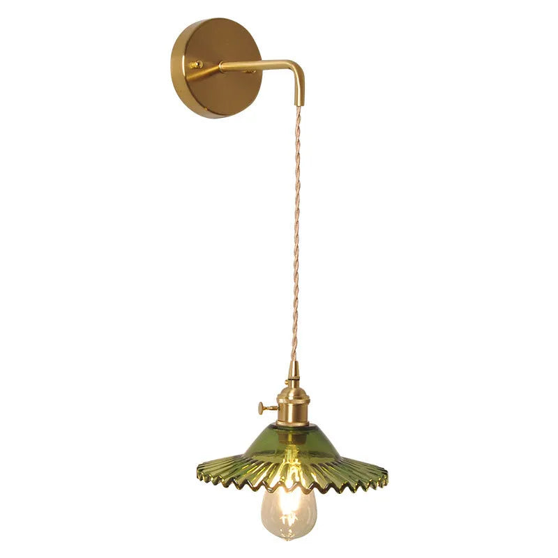 Retro brass lotus wall lamp with a glass shade in a choice of six colours.