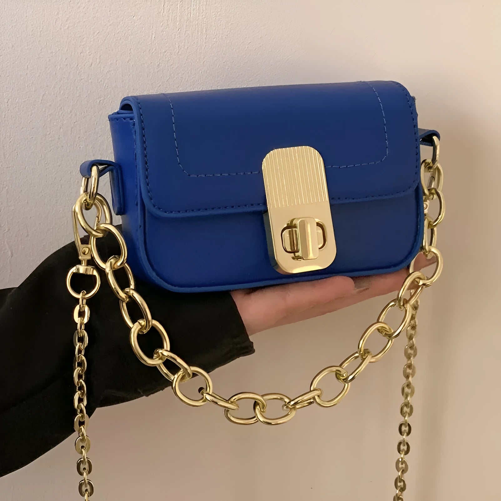 Niche chain shoulder messenger phone bag in horizontal square PU with soft handle and lock detail, brown colour option