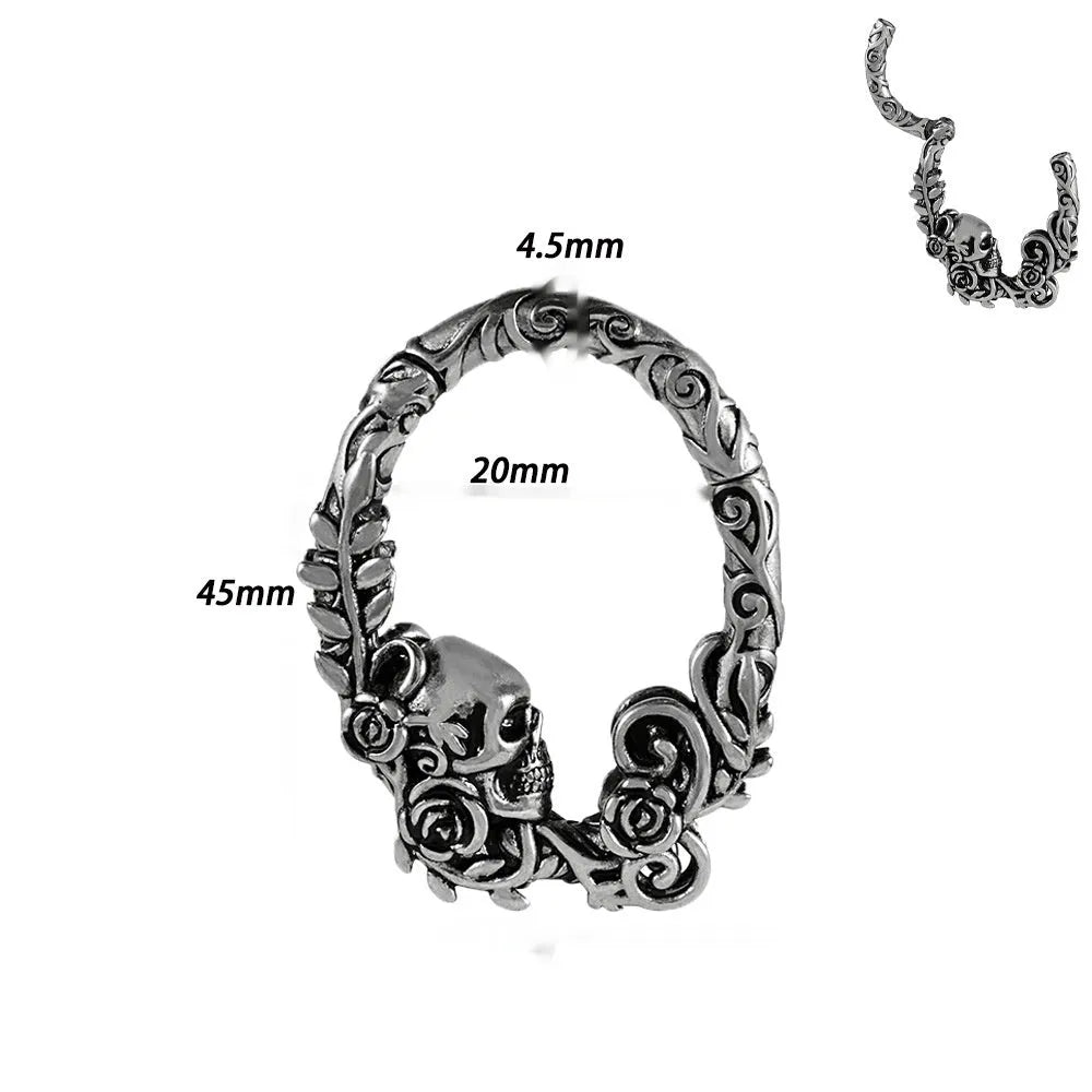 A pair of geometric cone and round shaped copper ear cuffs with magnetic clip-on fasteners.
