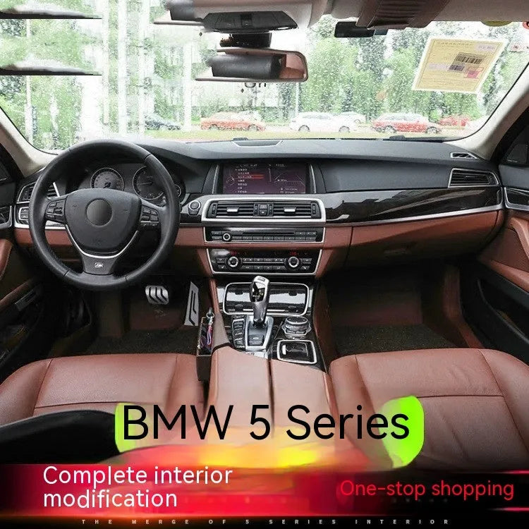 Black ABS and stainless steel interior handle trim strips for BMW 5 Series F10/F1 models, four-piece set.