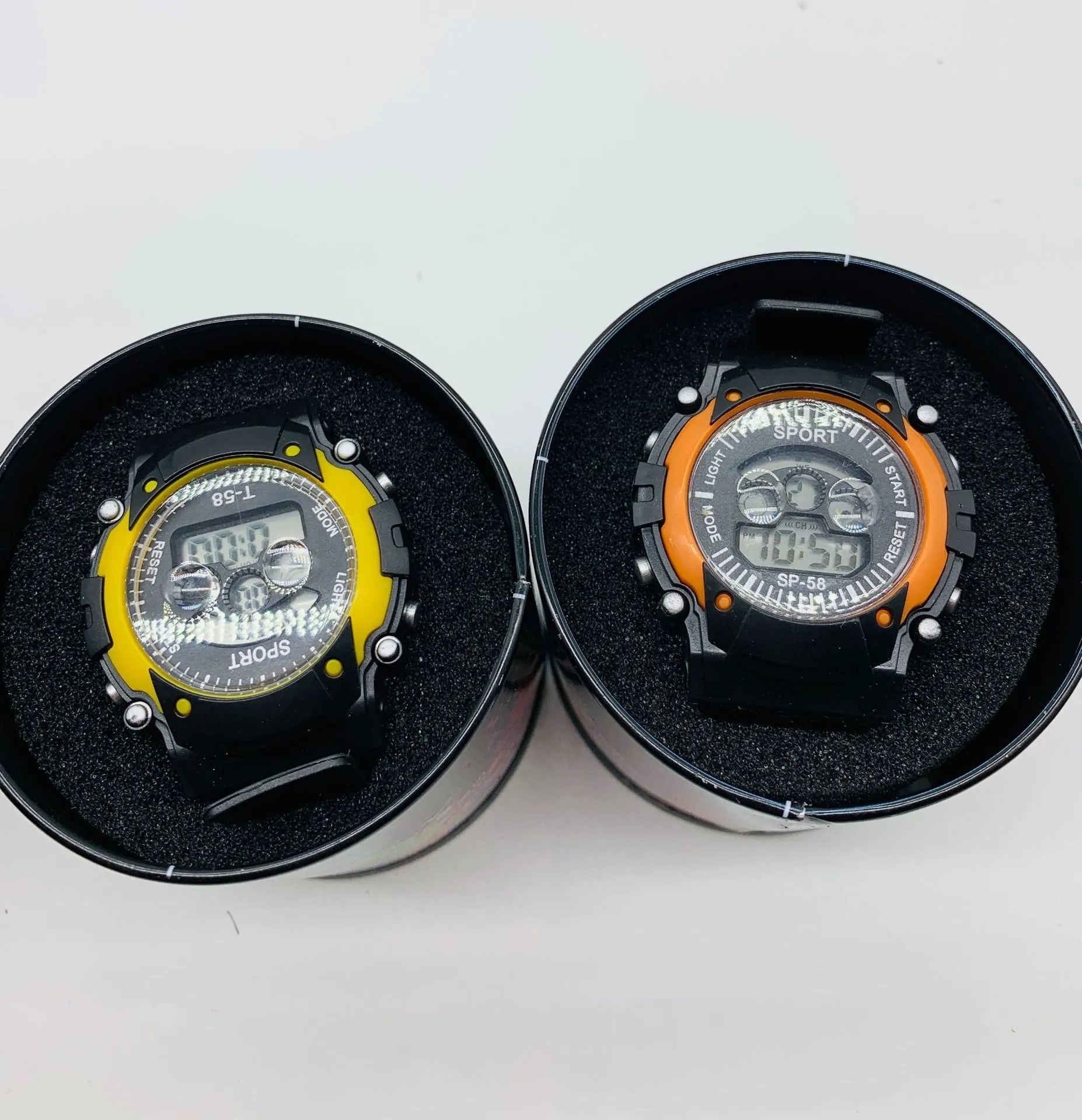 Digital sports watch for kids with colourful silicone strap and plastic case.