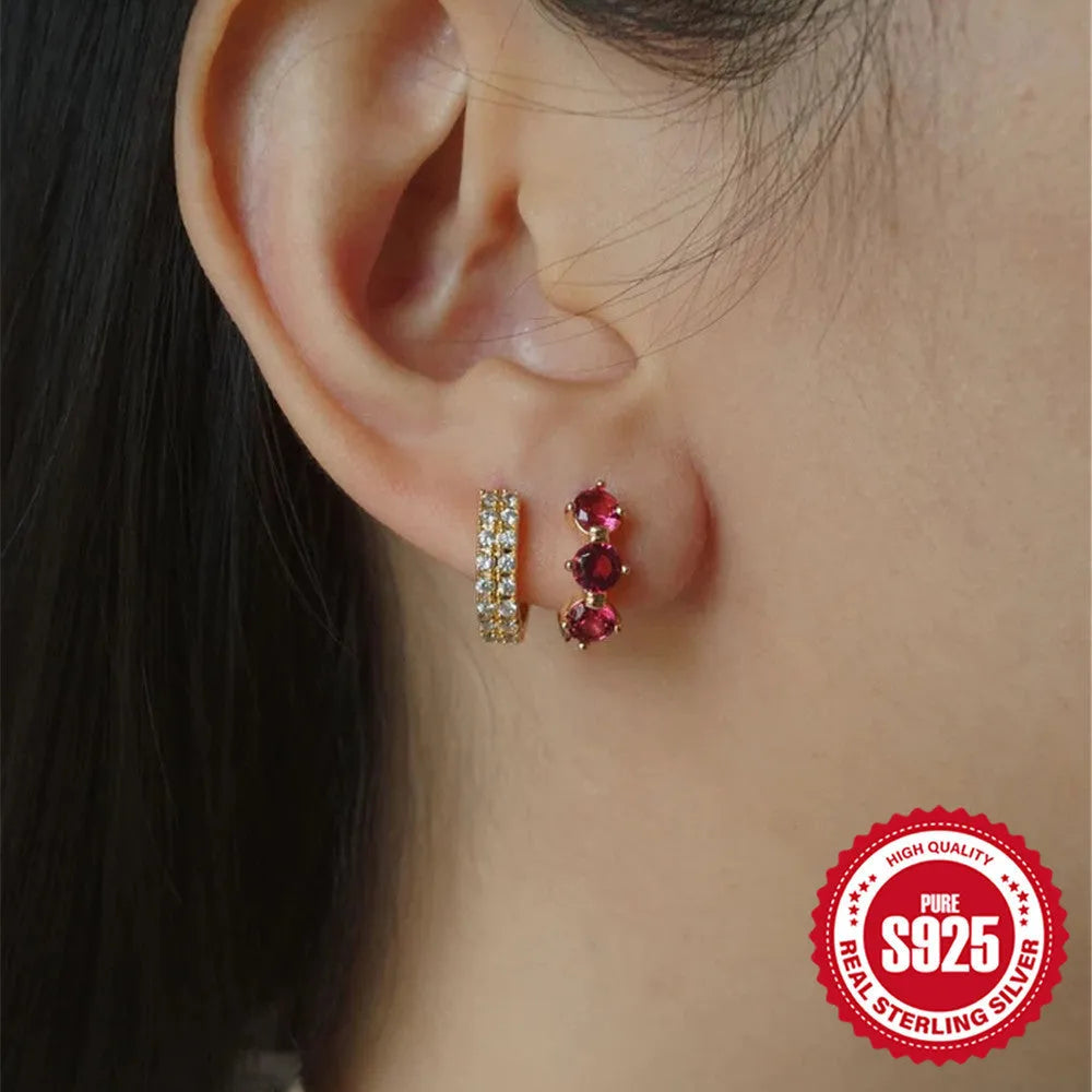 Pair of S925 sterling silver earrings with a sunflower geometric design and golden three diamonds.