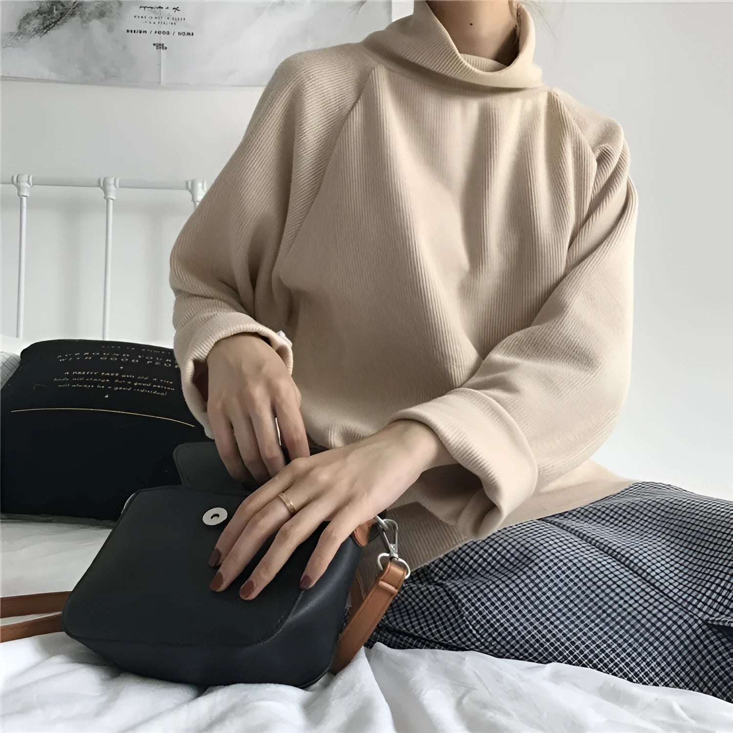 Women's solid colour polyester top with a half-high collar and long sleeves in a loose fit.