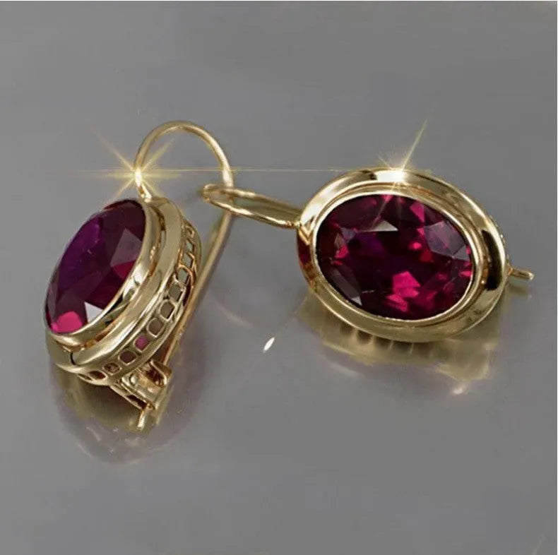 Women's minimalist earrings with red oval gemstone in geometric hollow design, silver electroplated alloy