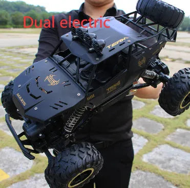 Large black 4WD remote control off-road climbing car with 2.4G wireless controller