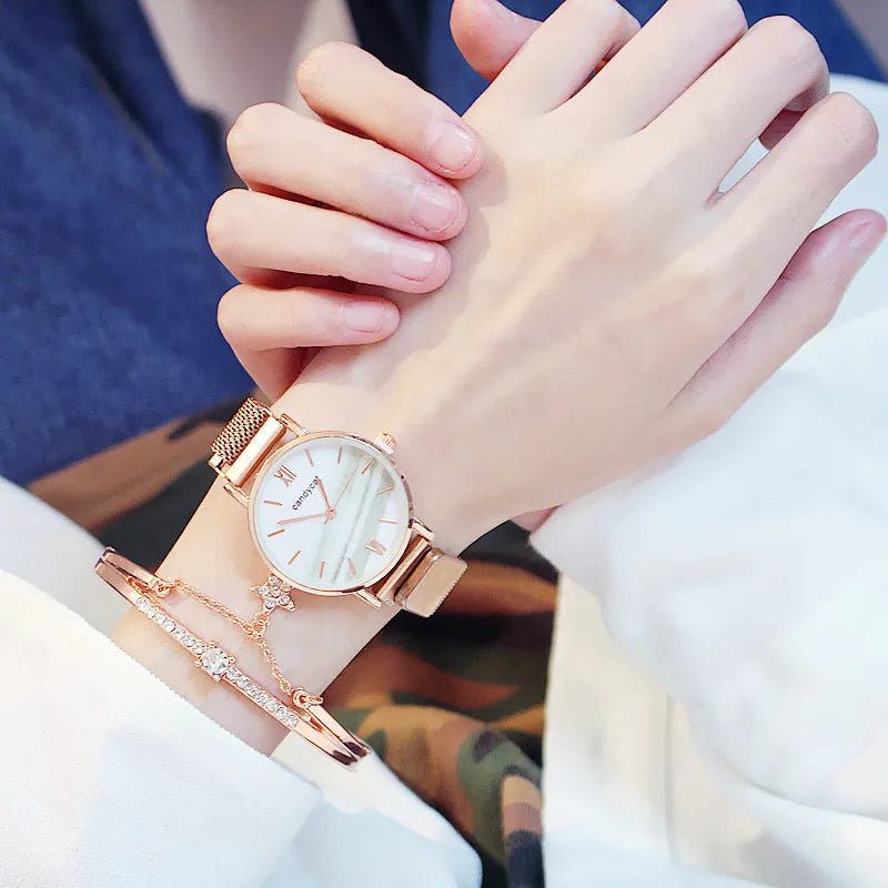 Women's retro marble watch with 32mm round dial, alloy strap, and titanium case back on white background