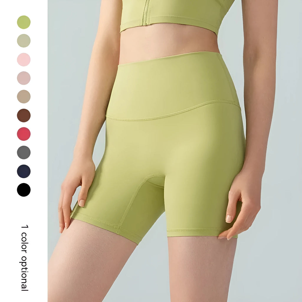 Women's high waist leaf green Lycra yoga shorts for fitness and cycling.