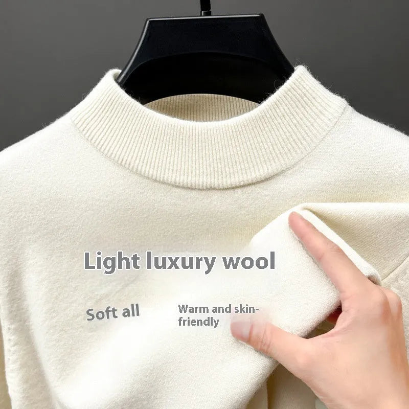 Men's solid colour fine wool half turtleneck long sleeve pullover on a hanger