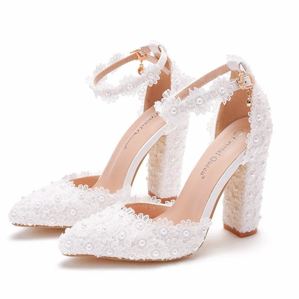 White chunky heel pointed sandals with artificial PU upper and buckle closure