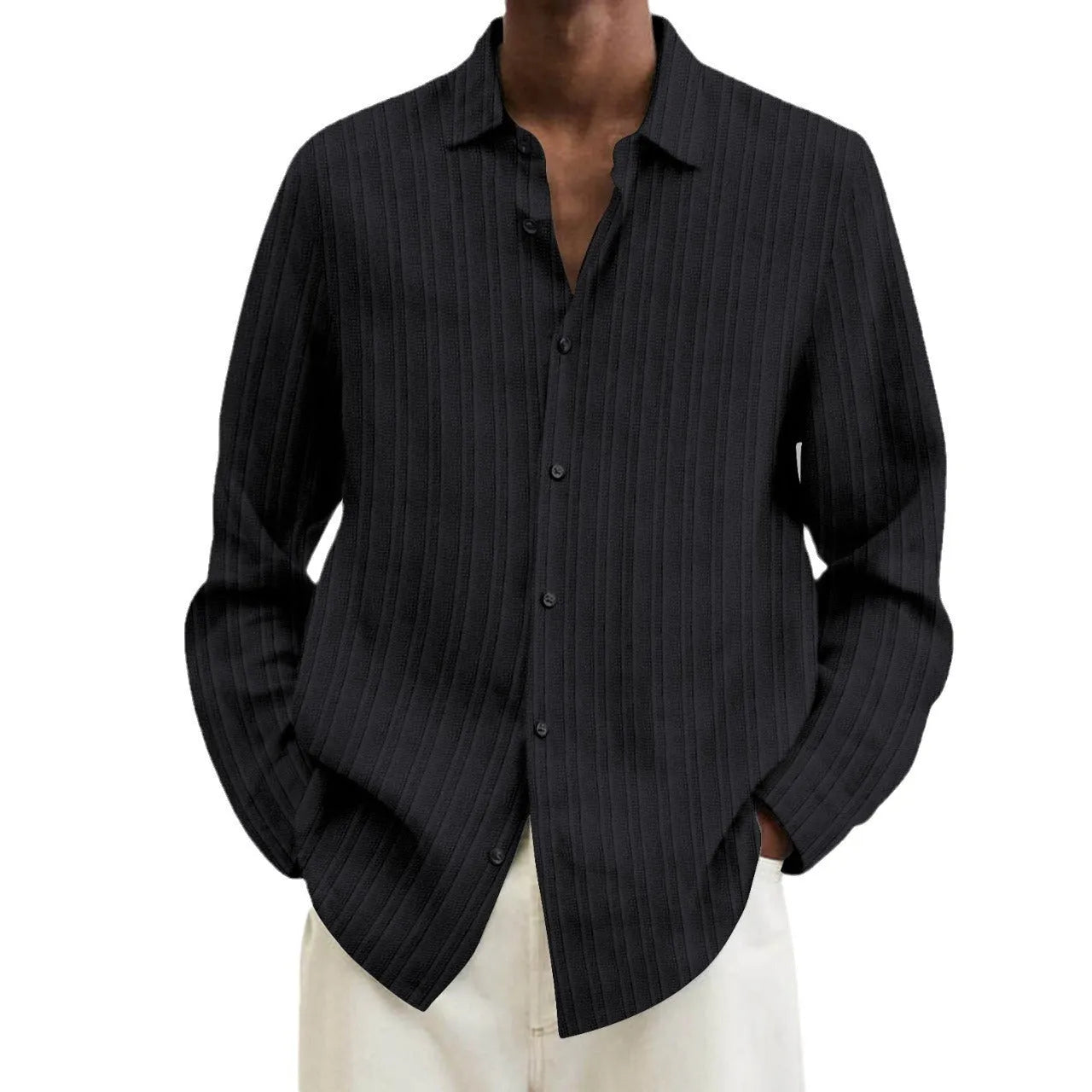 Man wearing a loose fit striped cardigan shirt in British style with a 3D pattern.