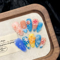Plastic wearable armour with 3D jellyfish carving in almond nail colour