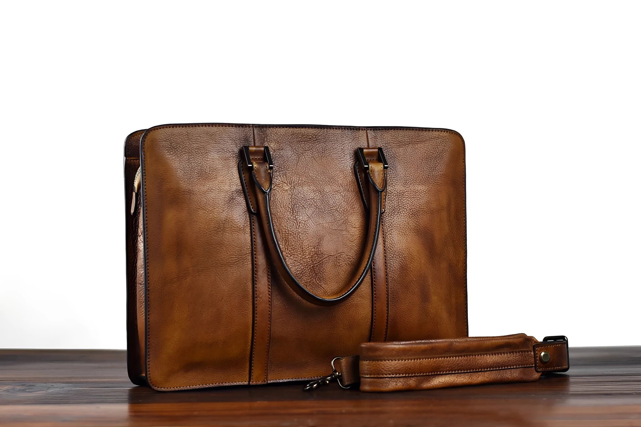 Men's brown leather horizontal business handbag with zip opening showing 14-inch size
