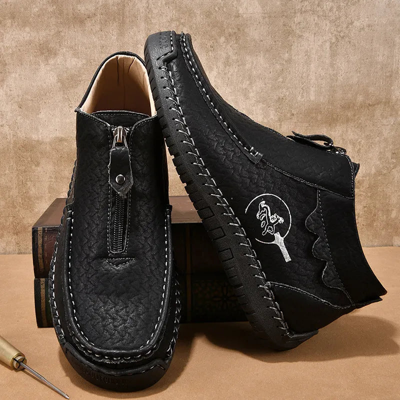 Men's black slip-on casual loafers with a round toe and rubber sole, shown from the side.