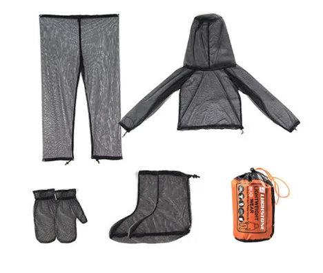 Adult wearing a light grey mesh anti-mosquito suit with hood, full-length pants, and booties for outdoor protection.