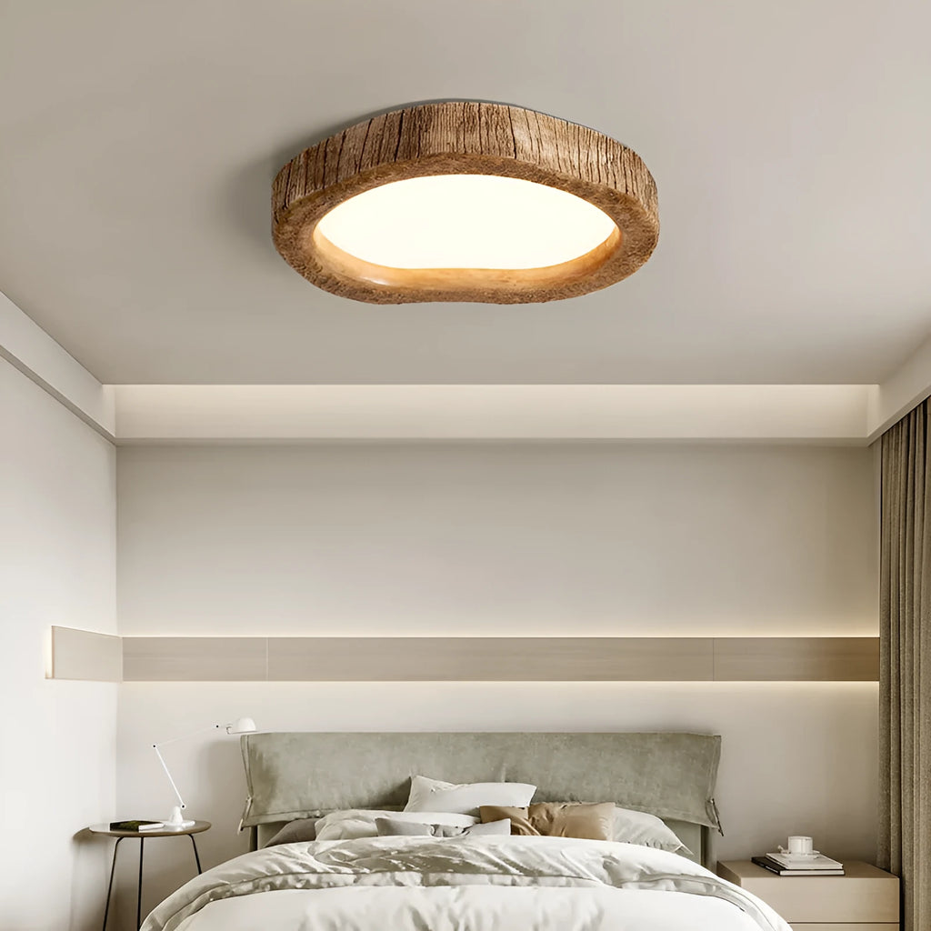 Round wood grain finish ceiling lamp in new Chinese style, flush mounted on a white ceiling.