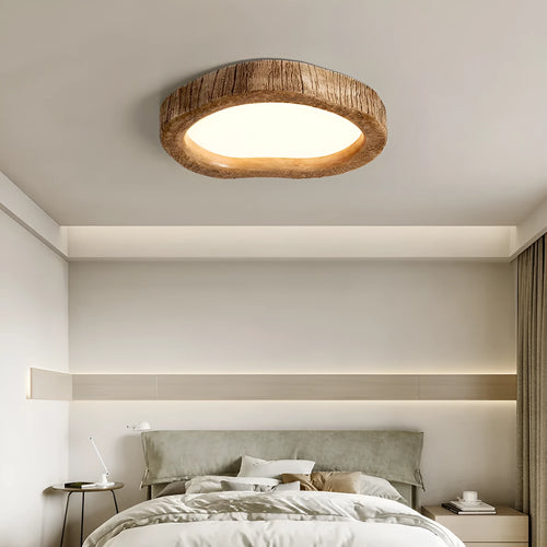 Round wood grain finish ceiling lamp in new Chinese style, flush mounted on a white ceiling.