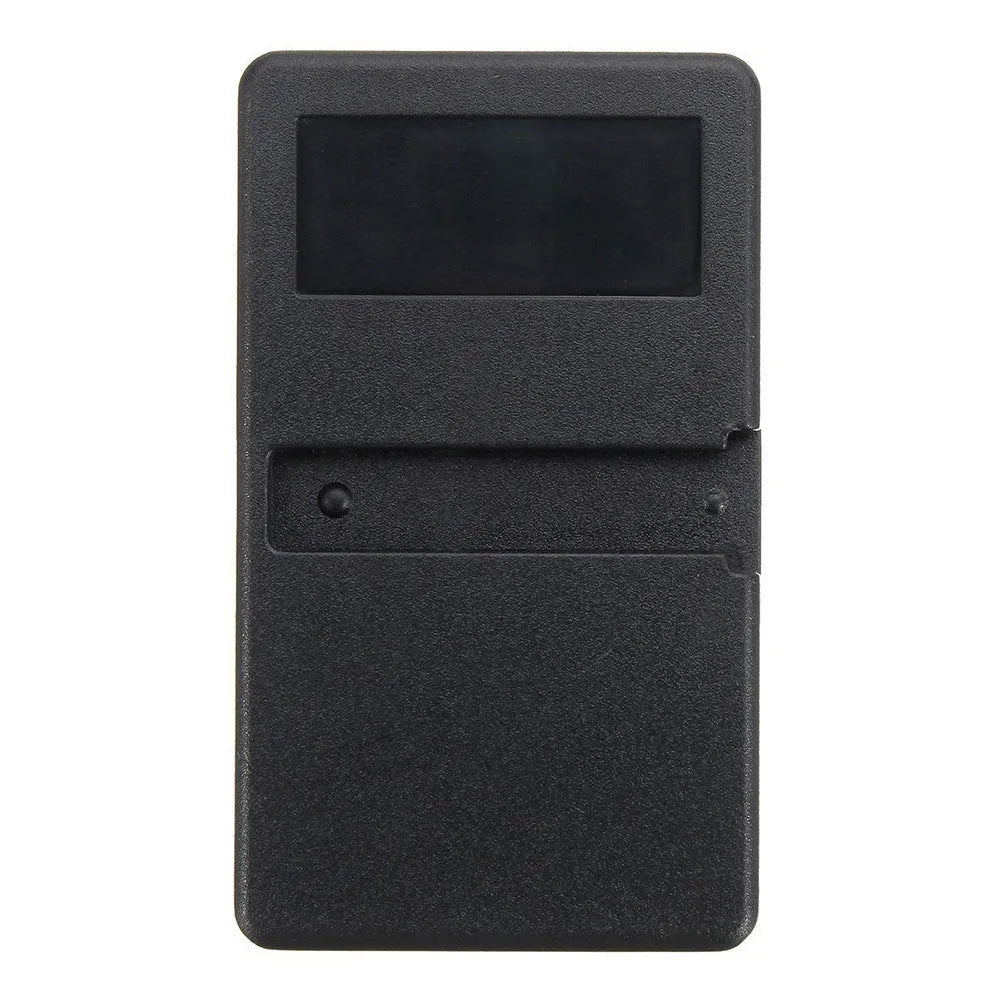 Black three-button garage door remote control on a white background.