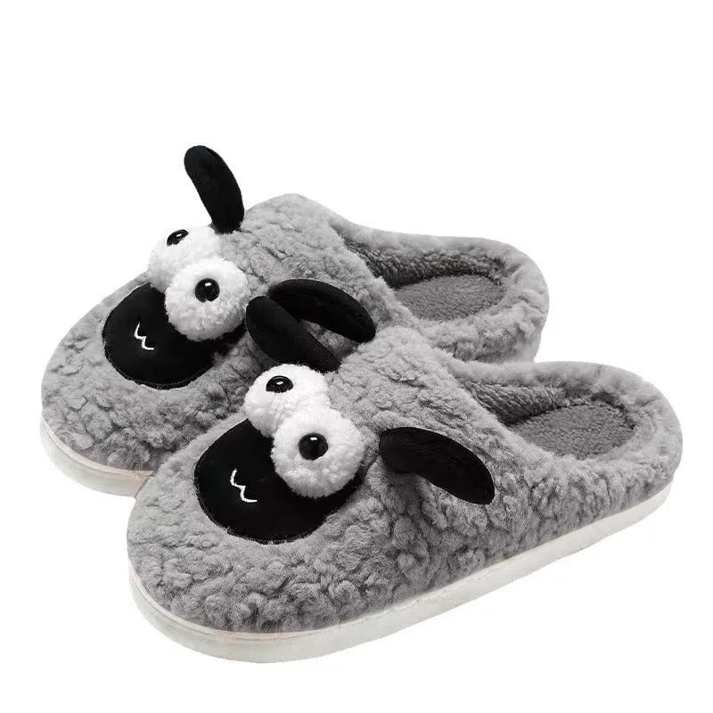 Brown thermal cotton slip-on slippers with suede upper and textured PVC sole on a wooden floor.