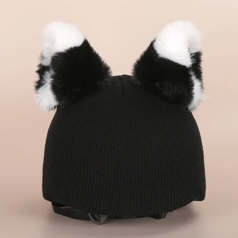 Cute plush cartoon animal character hat designed to decorate a standard ski helmet.