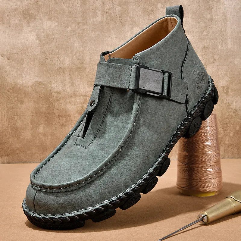 Men's black handmade stitching slip-on casual flat shoes with a low heel.