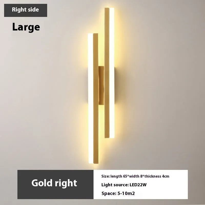 Modern Scandinavian minimalist LED wall light with acrylic shade in black or gold finish.