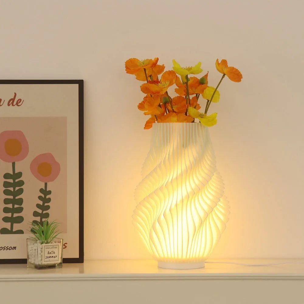 3D printed cylindrical vase night lamp in wood colour finish on a modern bedside table