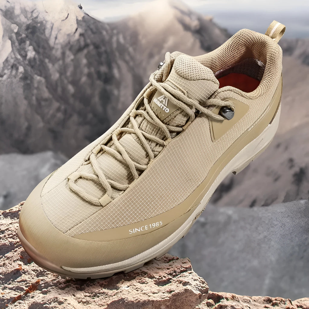 Low-top hiking boots in various colours with non-slip rubber soles and leather mesh upper