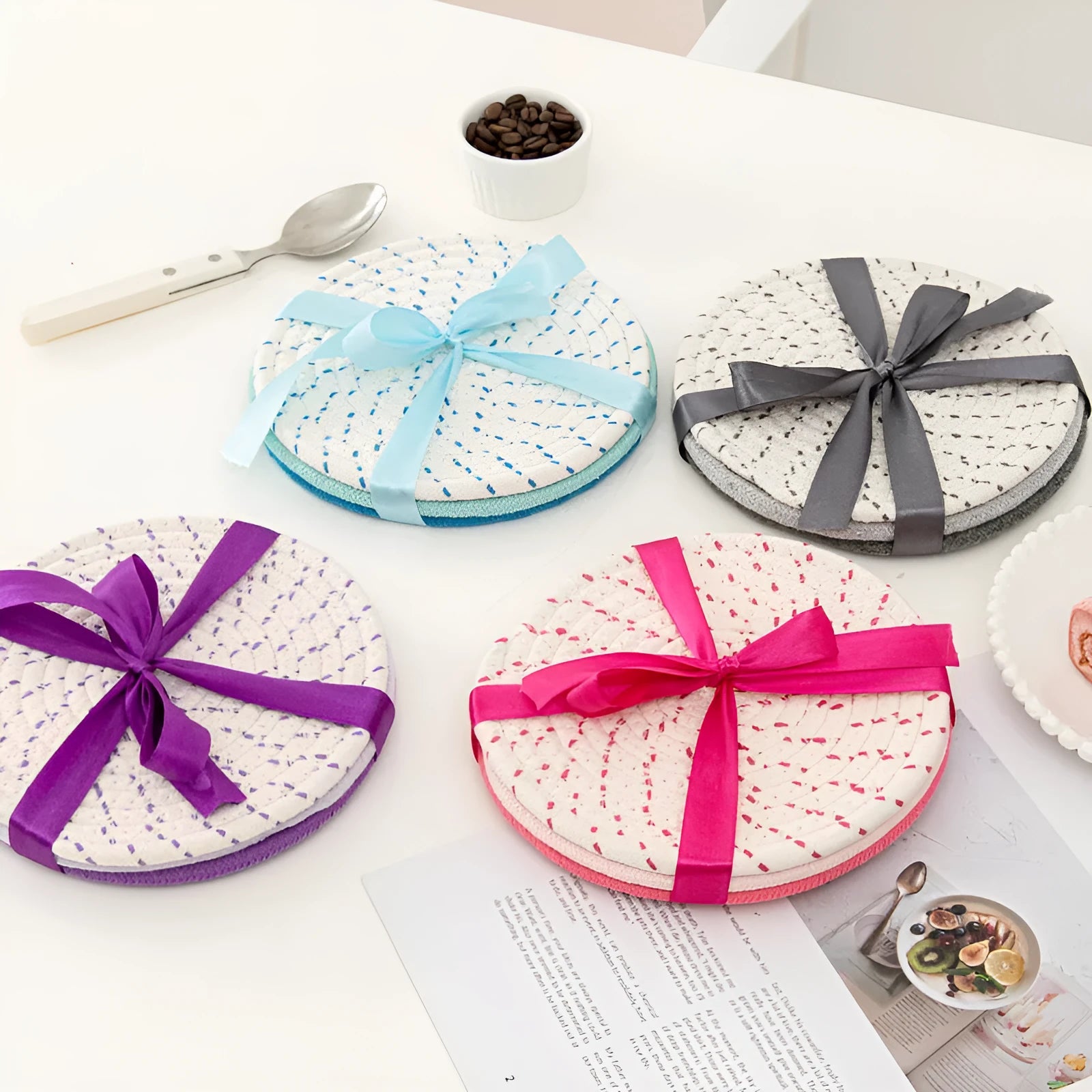Set of three round cotton cord coasters in blue colour, each measuring 18cm diameter