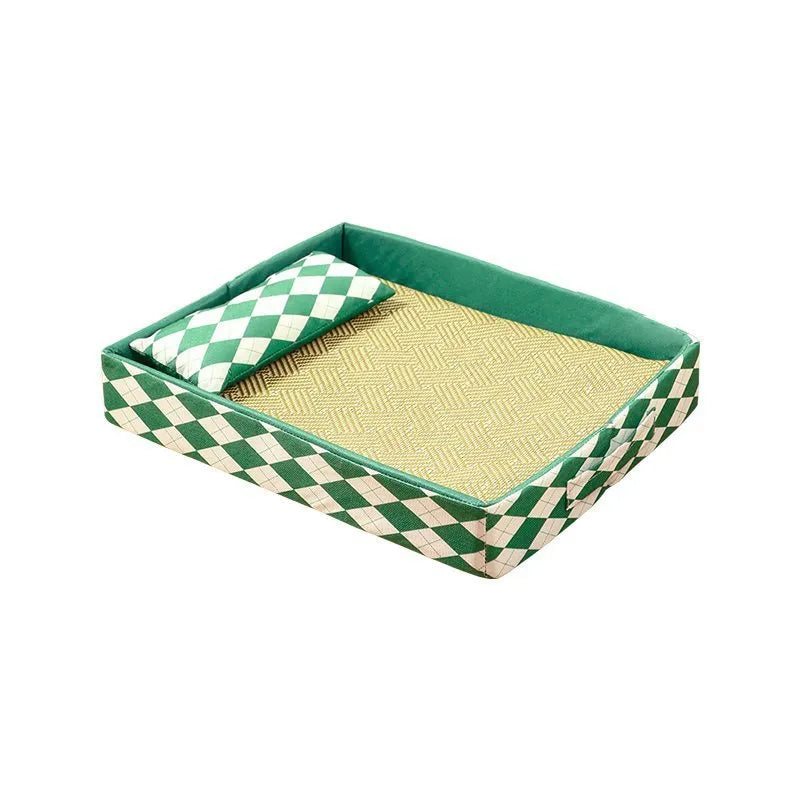Blue woven rattan cat bed with non-slip base placed on a wooden floor.
