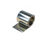 Close-up of a 304 stainless steel and leather adhesive strip for automotive use, showing its thin, metallic profile.