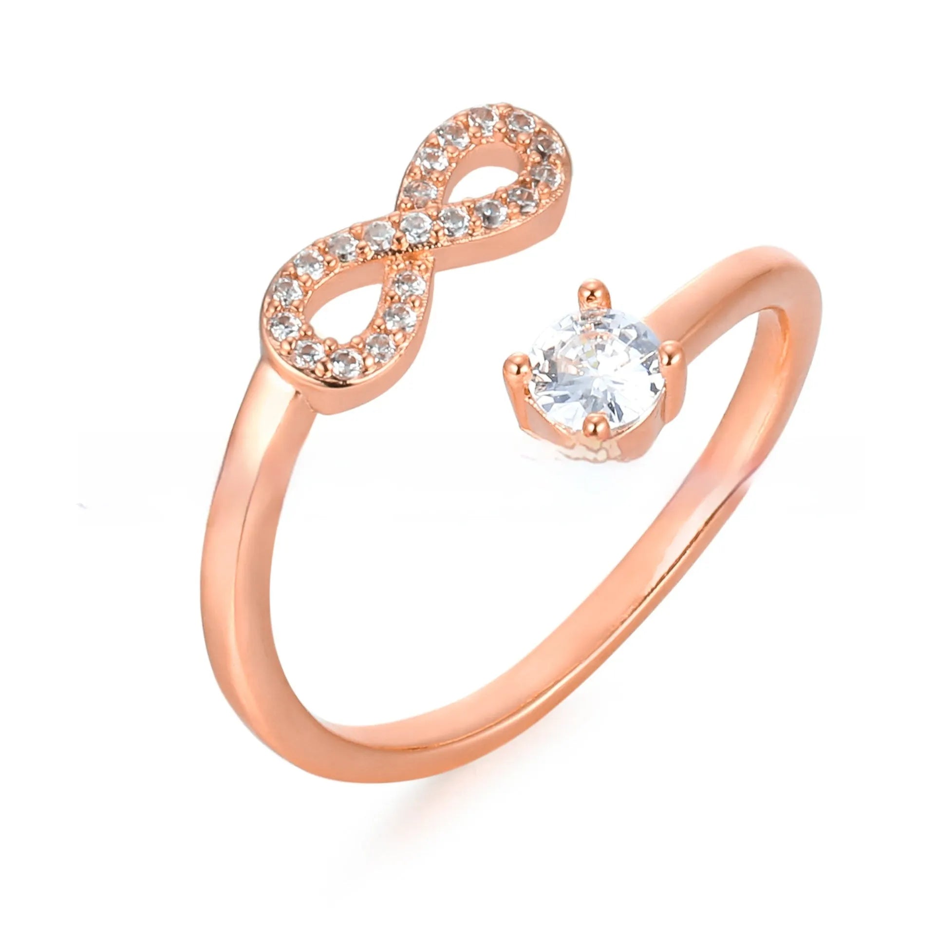 Geometric open zircon letter ring showing metal construction with inlaid gems in gold rose gold or silver finish