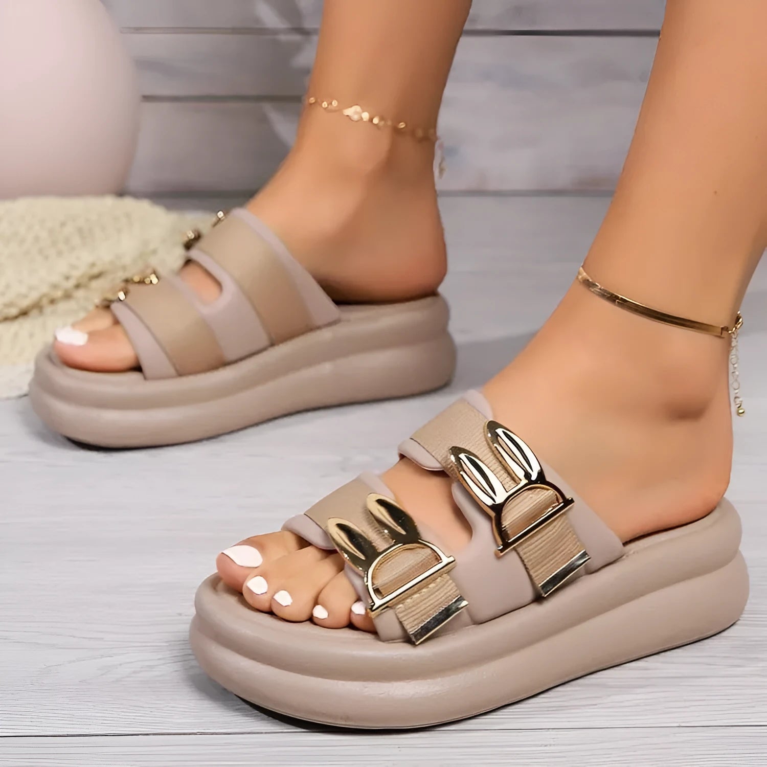Women's suede slippers with soft rubber soles in apricot colour