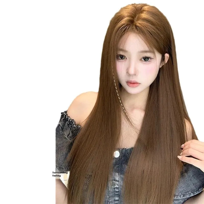 Warm brown lace front wig with centre-parted bangs and long straight hairstyle