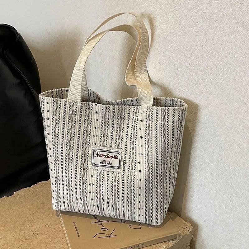 Japanese style large corduroy handbag in dark brown, shown with grey and ivory white colour options.