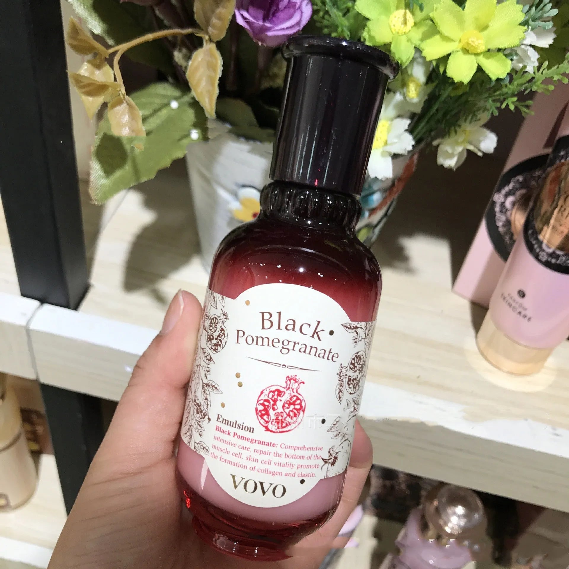 Pomegranate Extract Moisturising Water bottle, part of a skincare set with cream, essence, eye cream and cleanser.