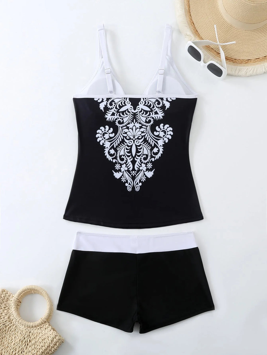 Plus size black and rose red split swimsuit set with matching trunks.
