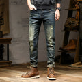 Men's skinny fit retro colour jeans with a zip fly, laid flat.