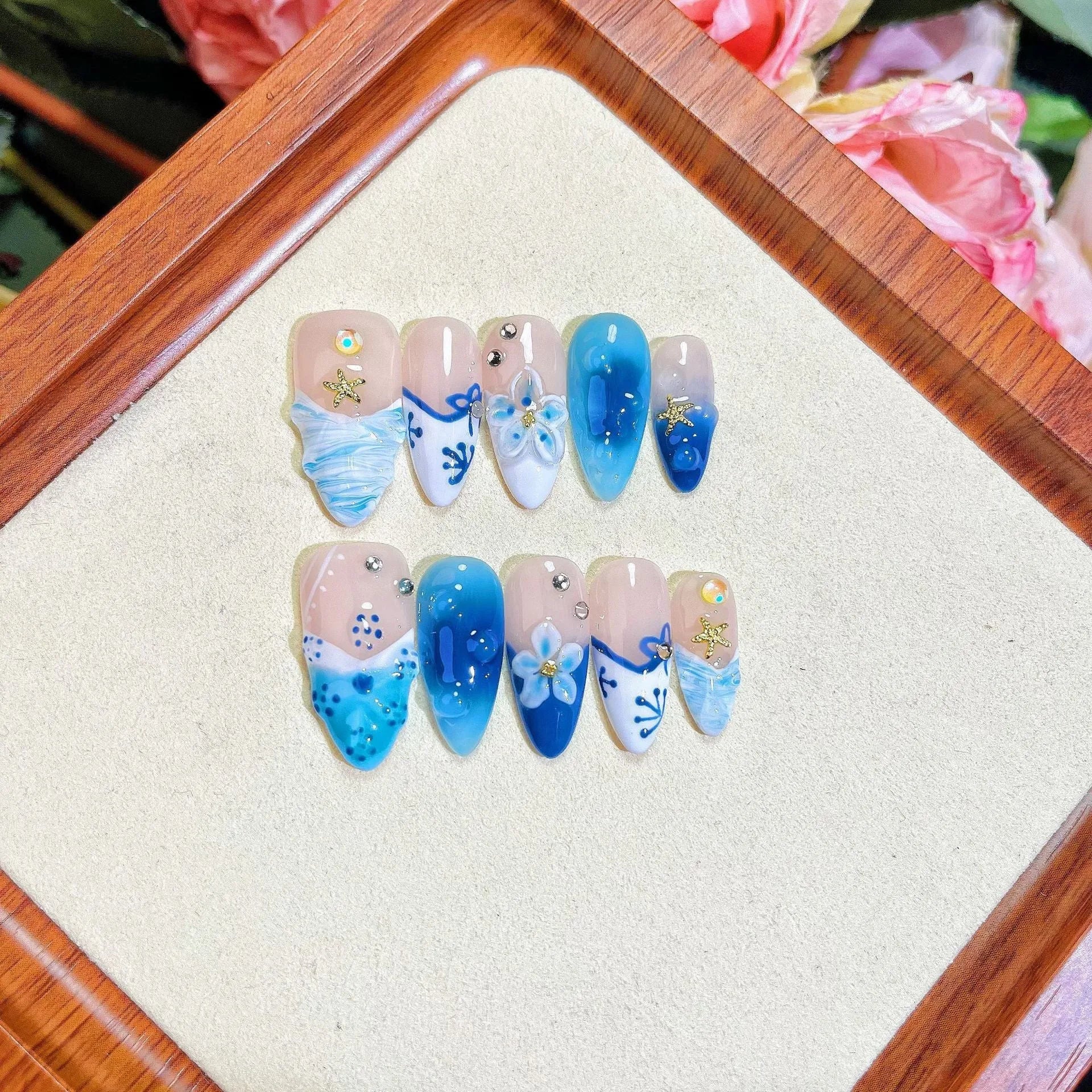Blue hand-painted carved summer ice transparent fake nails set in plastic