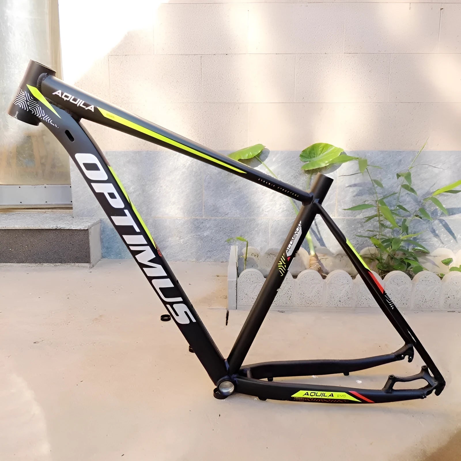 29-inch black-green aluminium mountain bike frame with disc brake mounts and inner cable routing