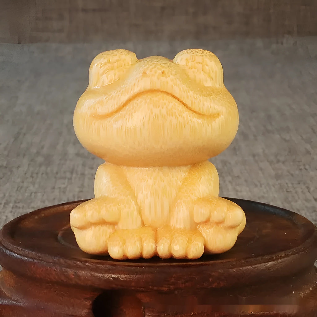 Smiling frog solid bamboo carving ornament measuring 5cm high with cartoon cute style