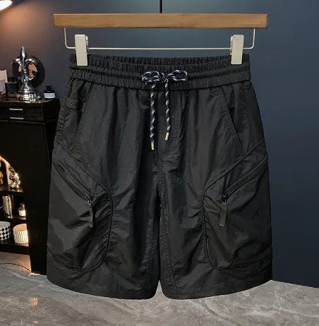 Men's camouflage cargo shorts in cotton blend fabric with loose fit and quick-drying properties