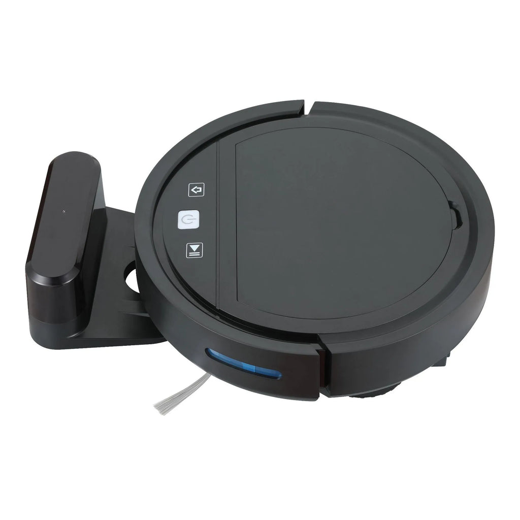 Black automatic recharge vacuum cleaner with remote control on a hard floor, showing its charging base